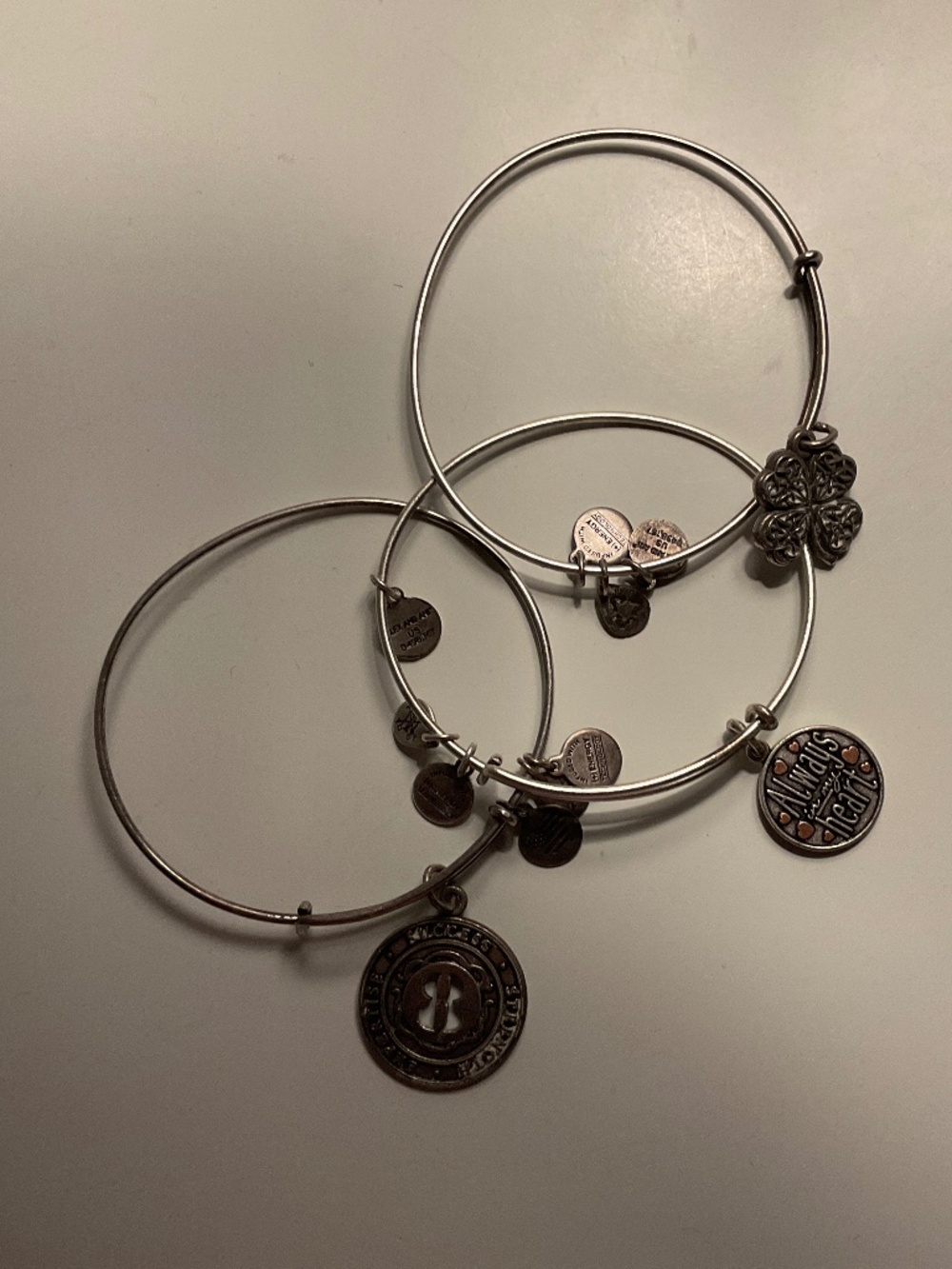 3 silver Alex and Ani Bracelets